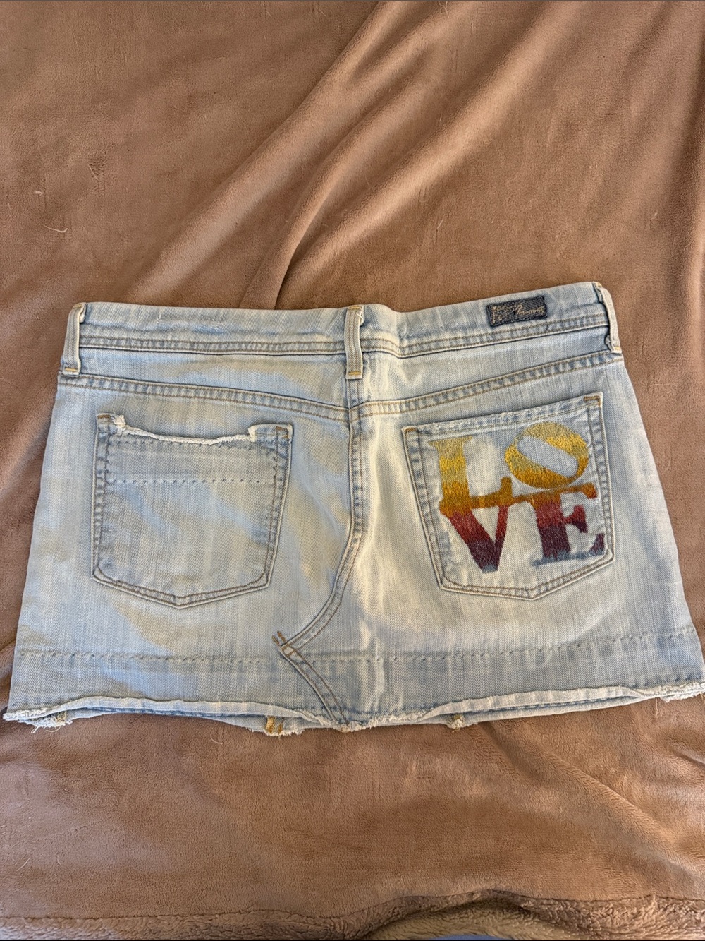 7 For All Mankind Light Blue Denim Mini Skirt with Multicolor 'LOVE' Pocket